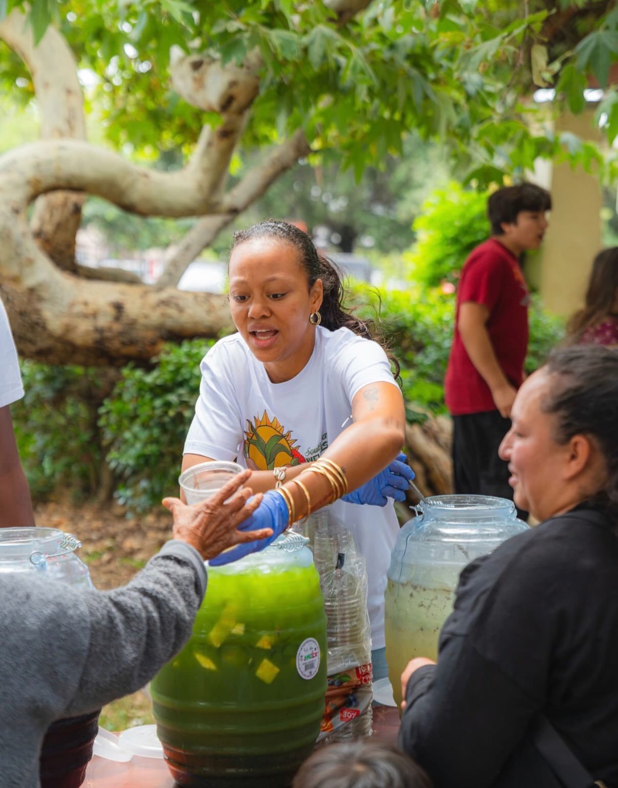 A wellness practitioner working with a community member